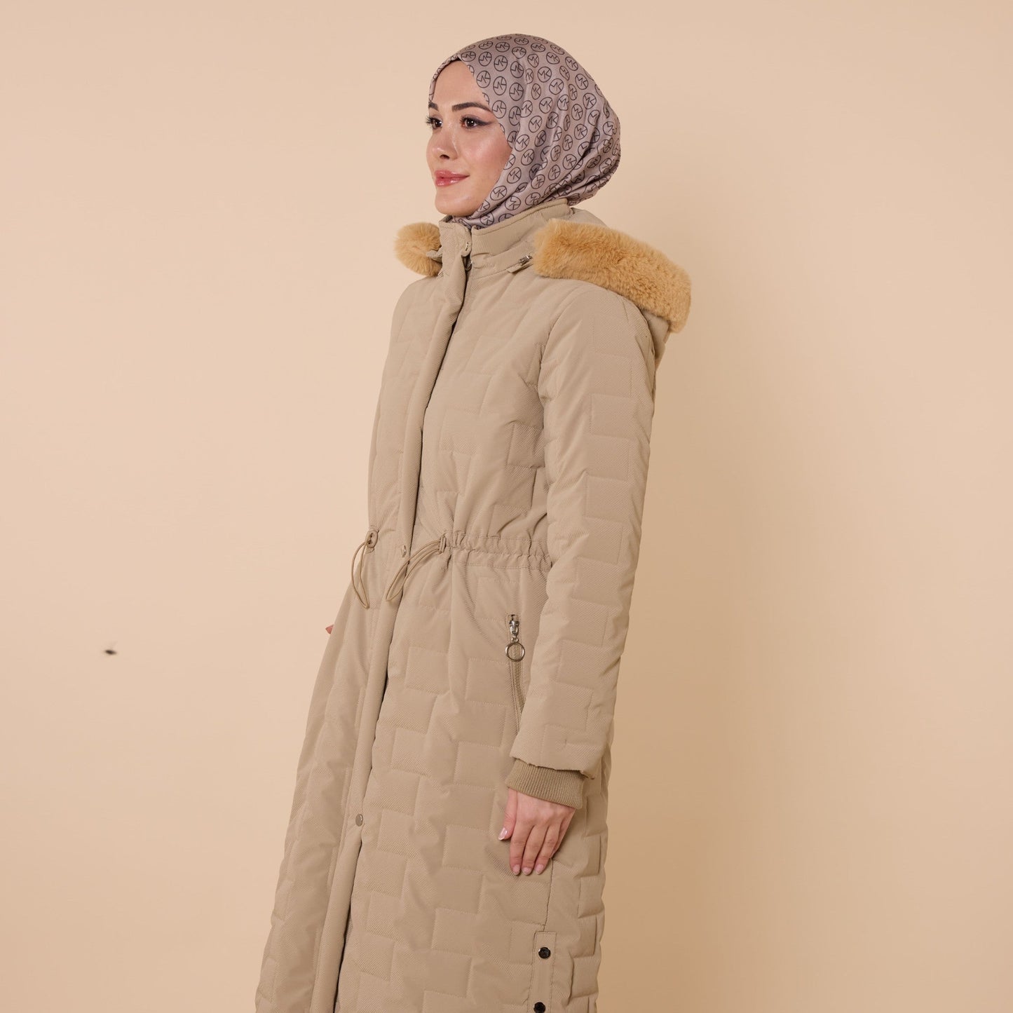 Quilted Coat With Fur Hood And Waist Tie Detail