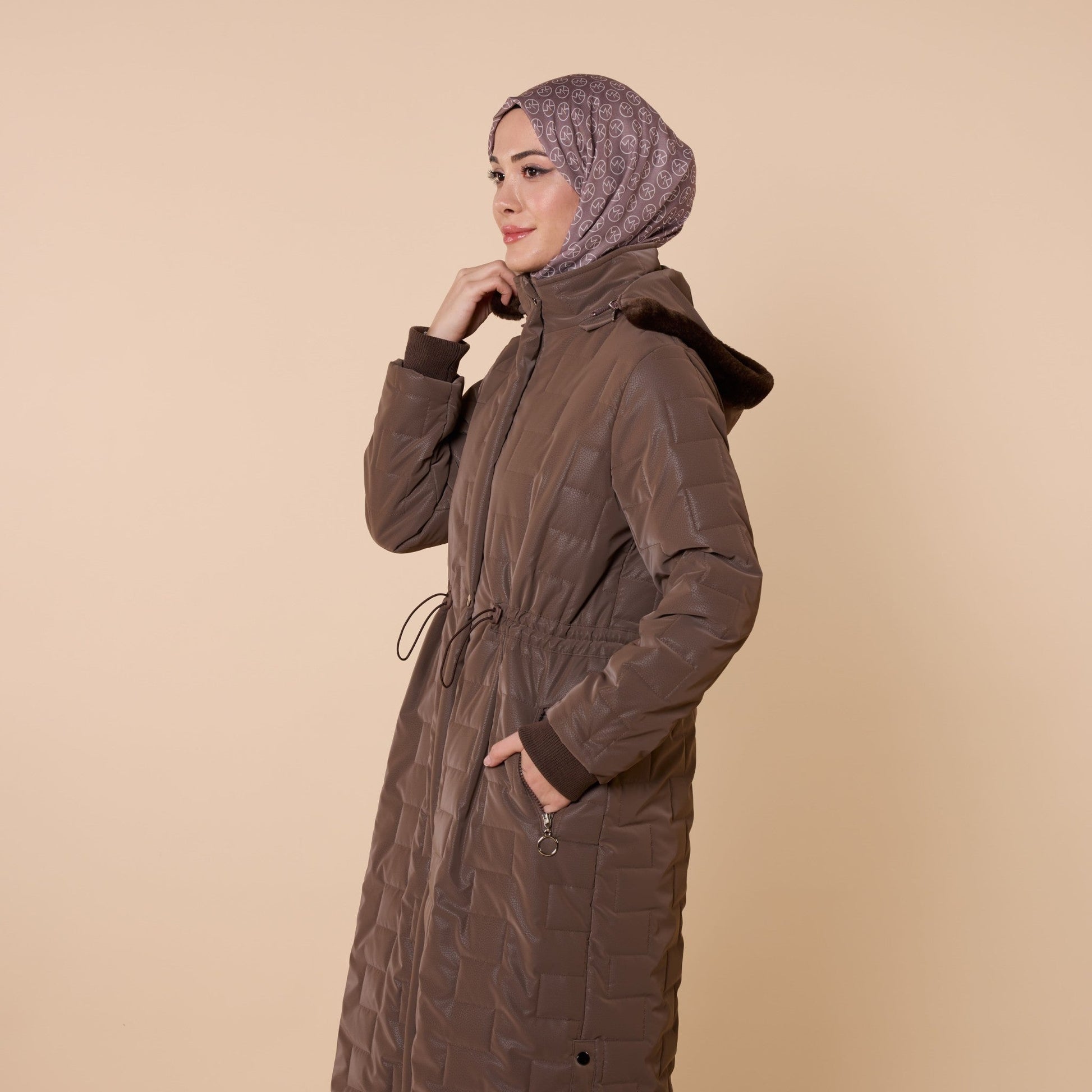 Quilted Coat With Fur Hood And Waist Tie Detail
