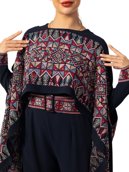 Elegance in Embroidery A Regal Red Jumpsuit