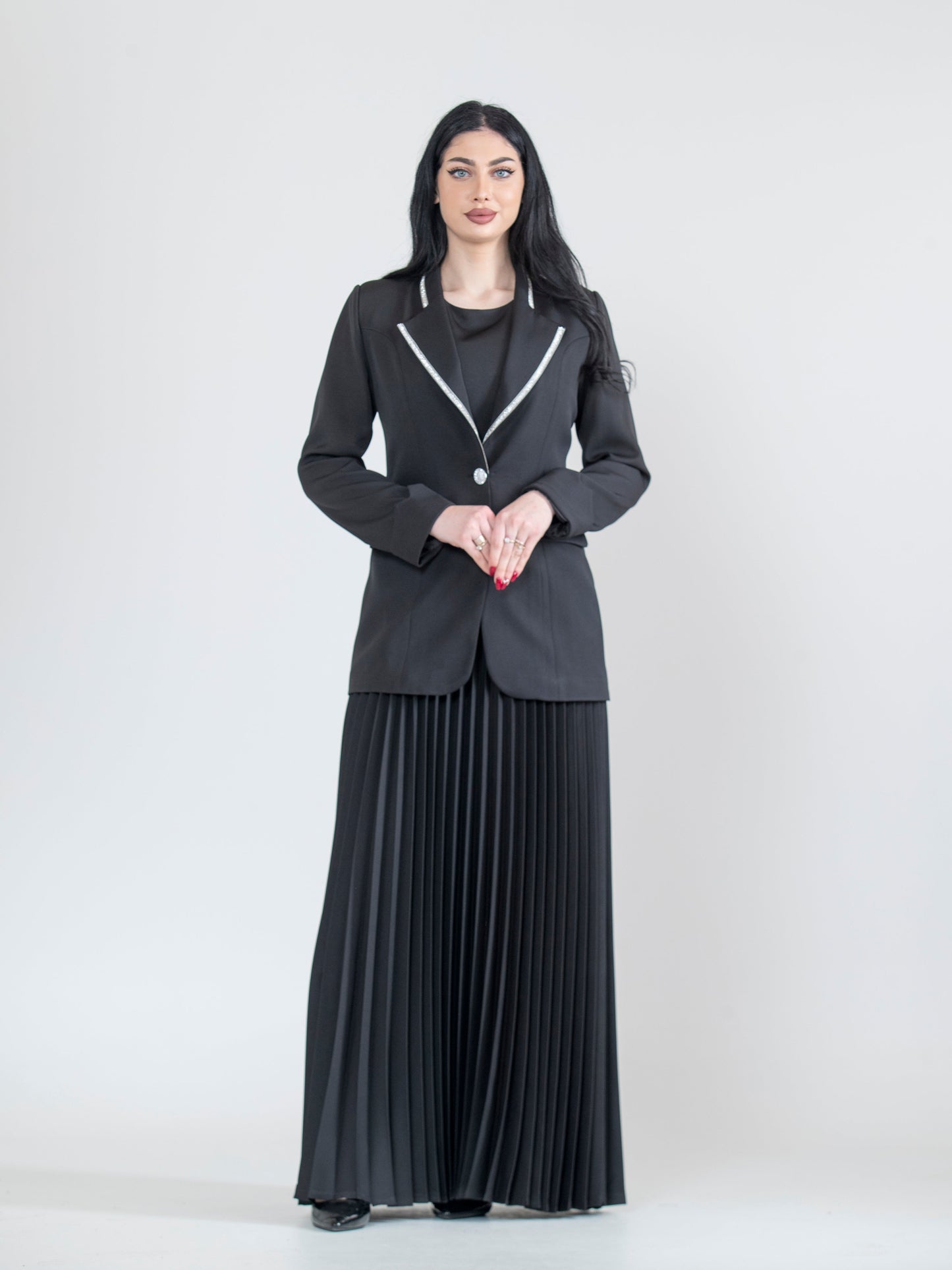 Dress with a modern blazer and pleated ruffles