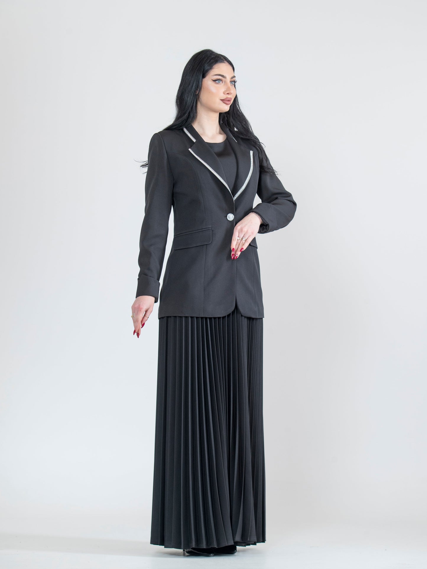 Dress with a modern blazer and pleated ruffles
