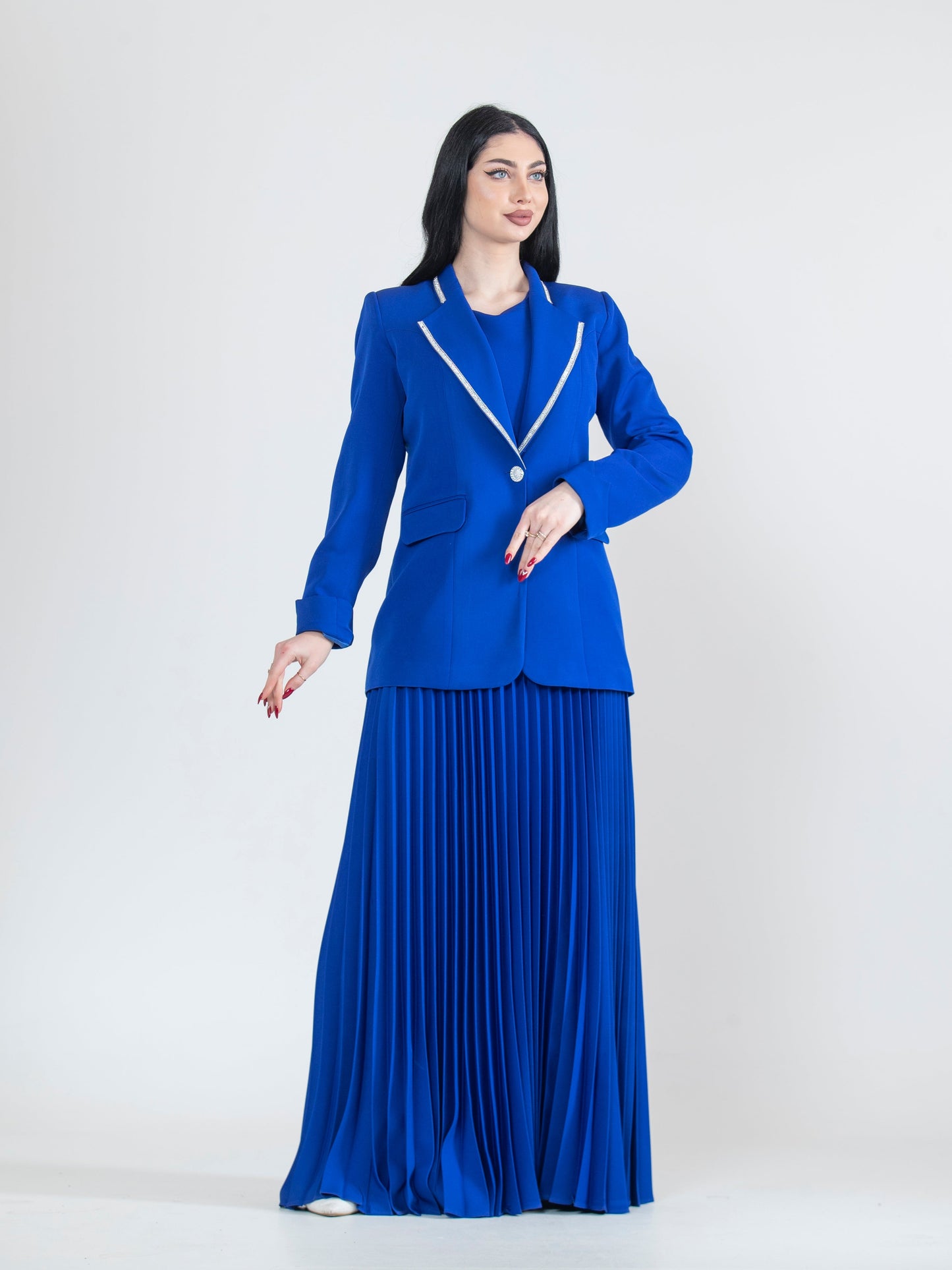 Dress with a modern blazer and pleated ruffles