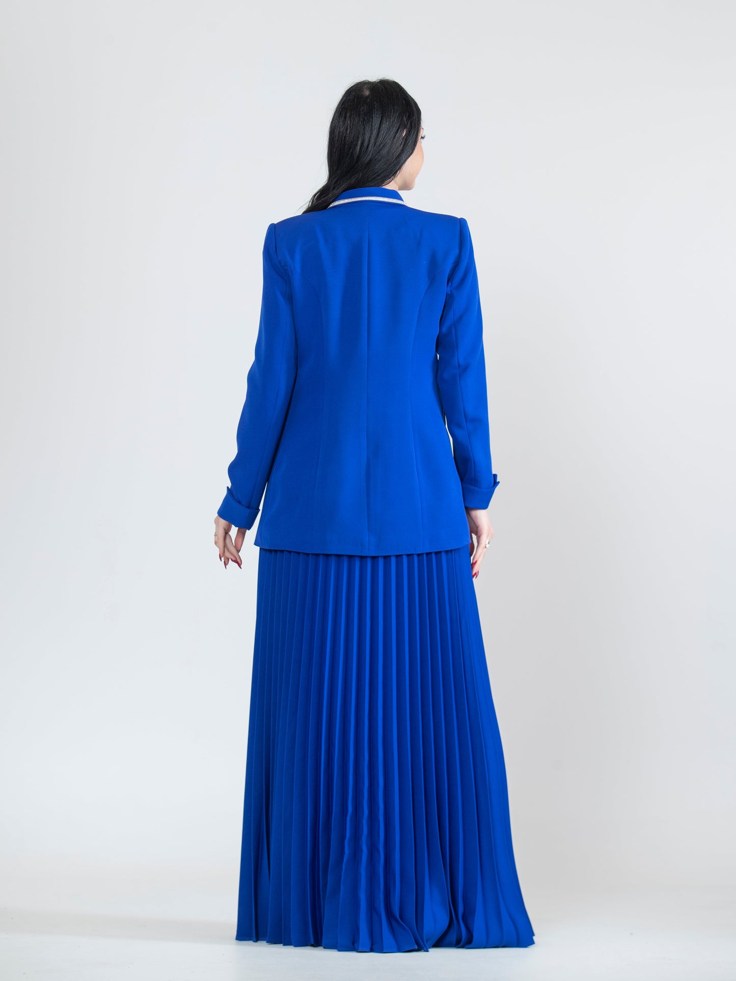 Dress with a modern blazer and pleated ruffles