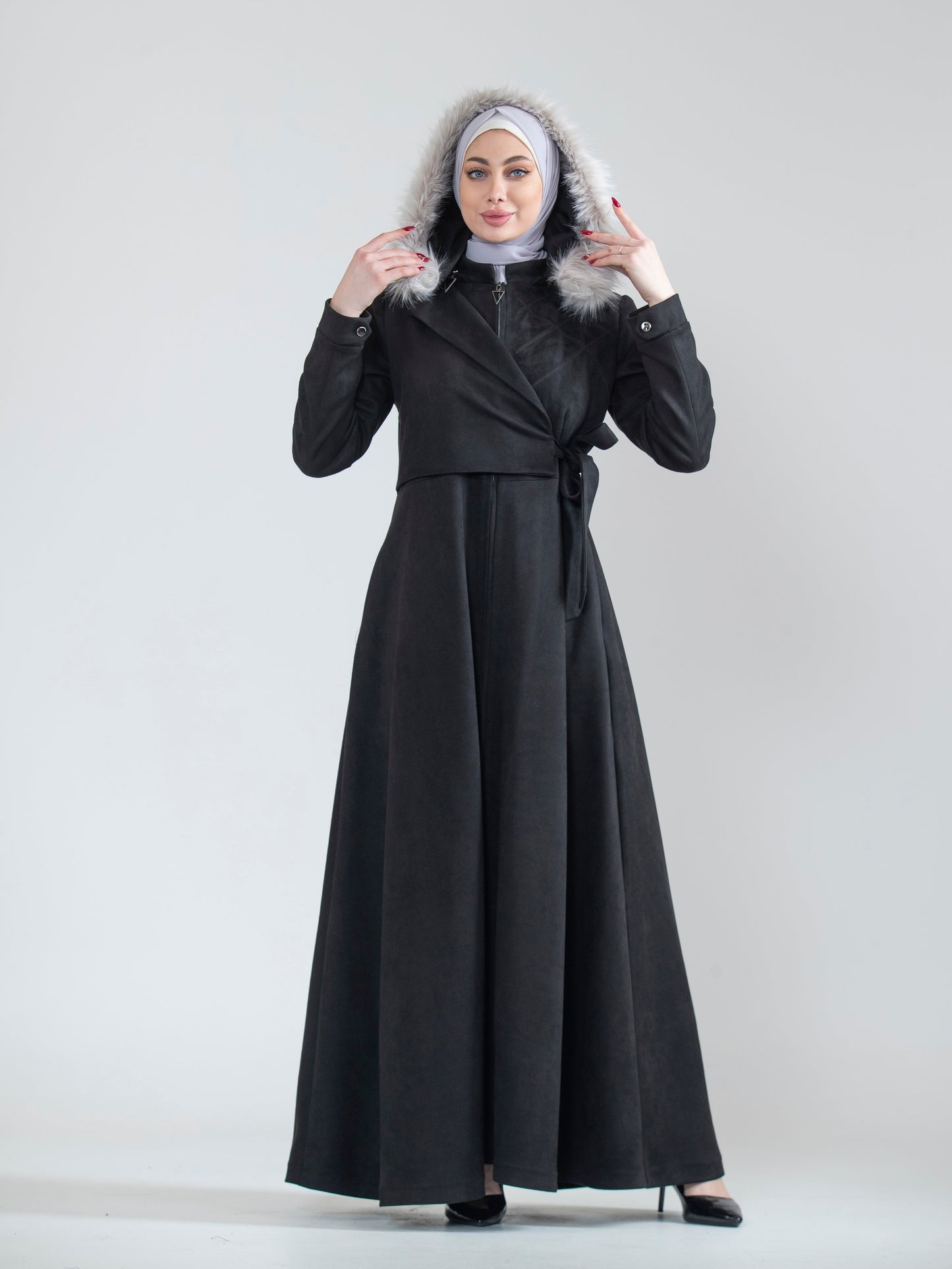 Embroidered women's jilbab and fur hat